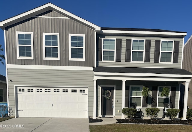 view of front of property featuring a garage and driveway