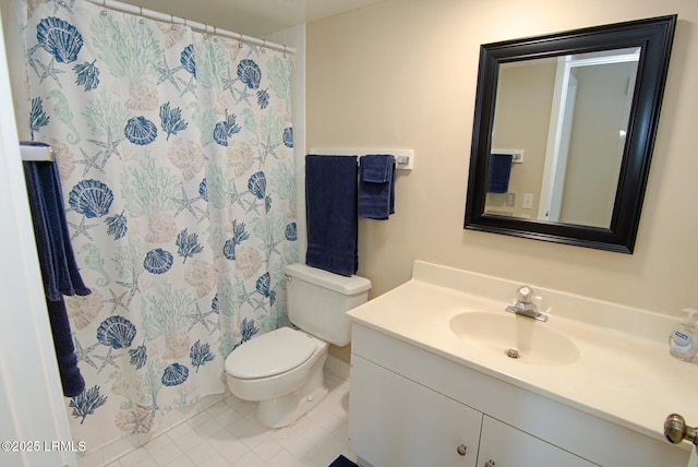 full bathroom with toilet, tile patterned floors, curtained shower, and vanity