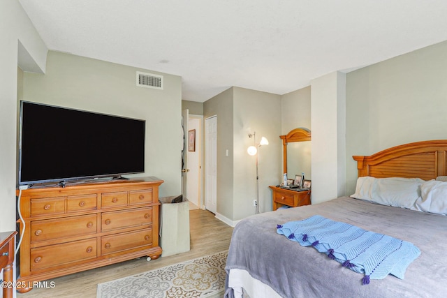 70 Paddle Boat Ln Unit 207, Hilton Head Island, SC 29928 - bedroom with light wood finished floors and baseboards