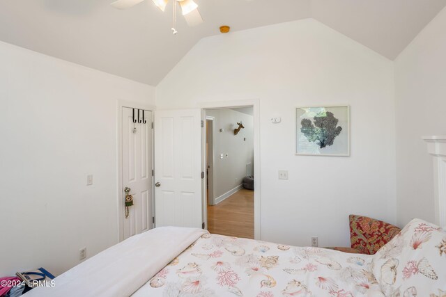 bedroom featuring ceiling fan and vaulted ceiling