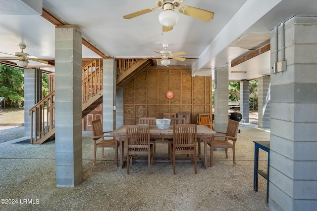 unfurnished dining area with wooden walls