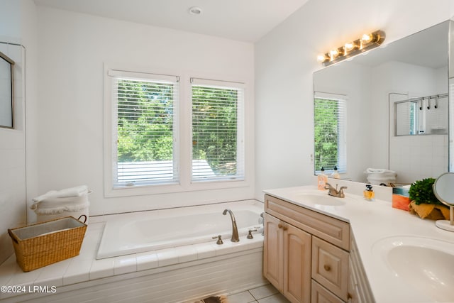 bathroom featuring vanity, plus walk in shower, and tile patterned flooring