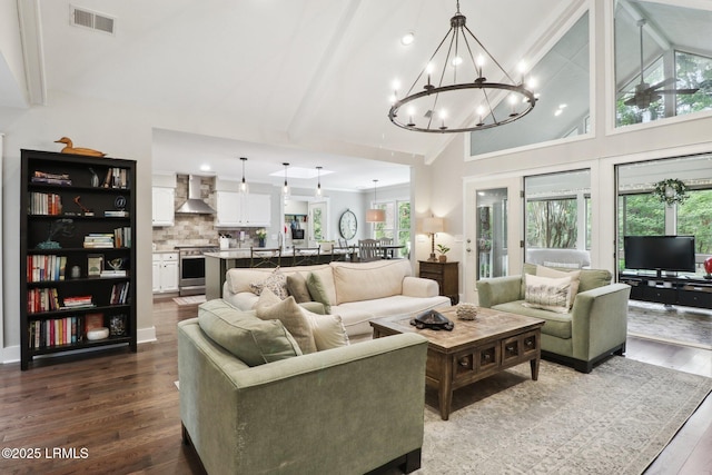 30 Longwood Dr, Okatie, SC 29909 - living room with dark wood finished floors, a chandelier, and recessed lighting