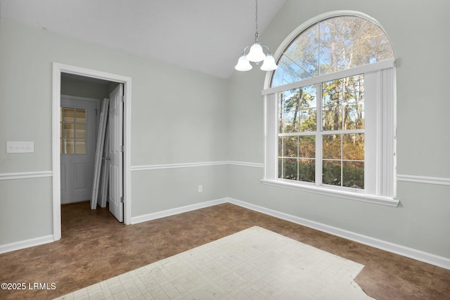 unfurnished dining area with baseboards, vaulted ceiling, and a notable chandelier