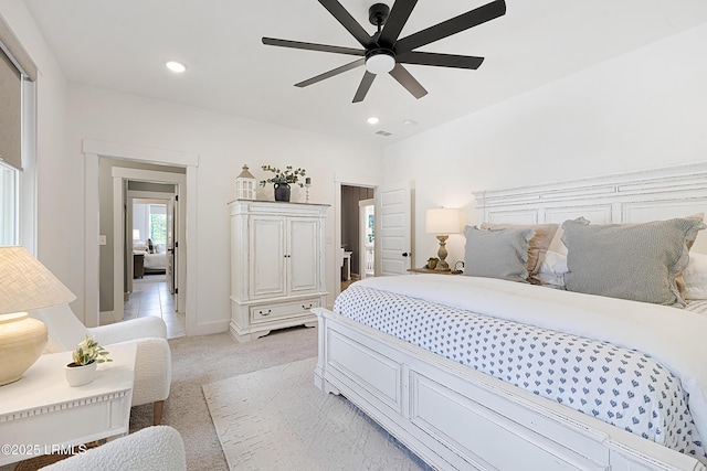 bedroom with recessed lighting, ceiling fan, light carpet, and baseboards