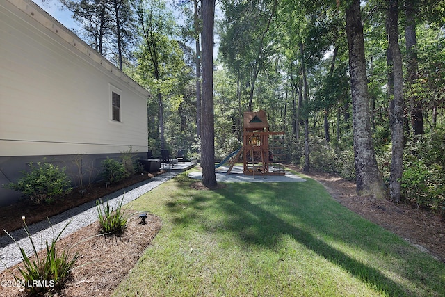 view of yard with a playground