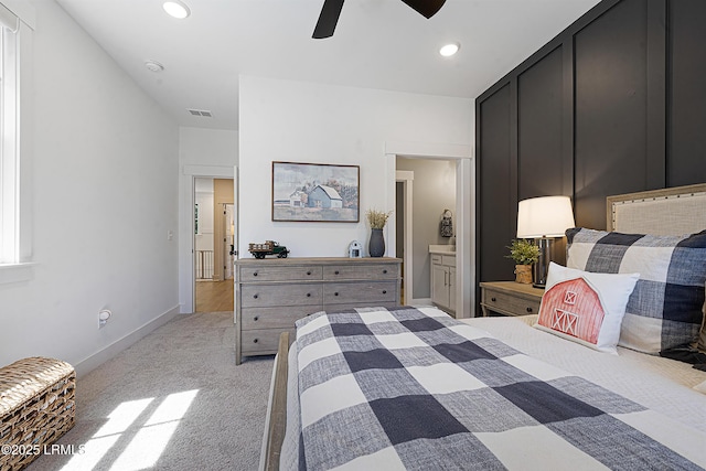 bedroom featuring light carpet, a ceiling fan, recessed lighting, and visible vents