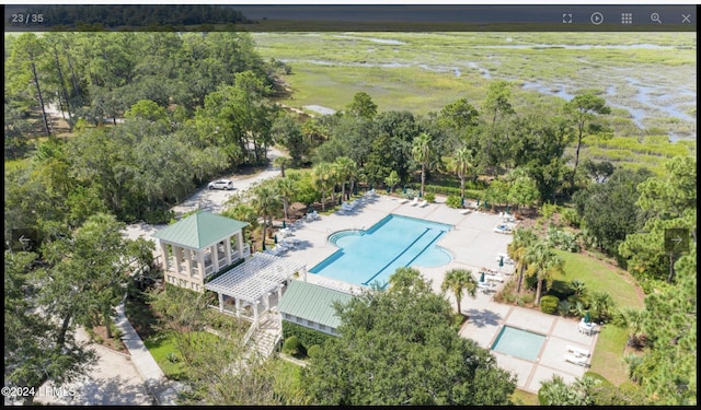 drone / aerial view featuring a water view