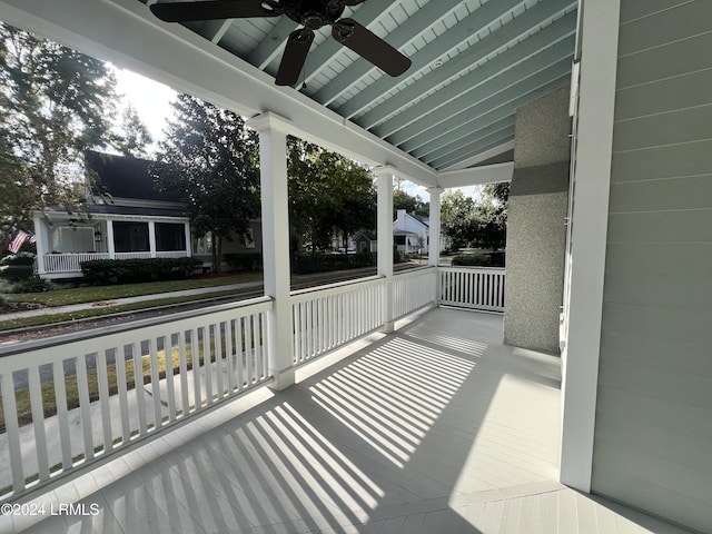 view of patio / terrace with ceiling fan and a porch