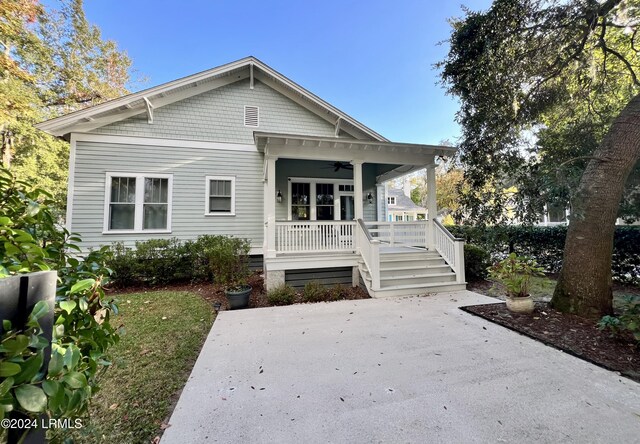 bungalow-style house featuring ceiling fan and a porch