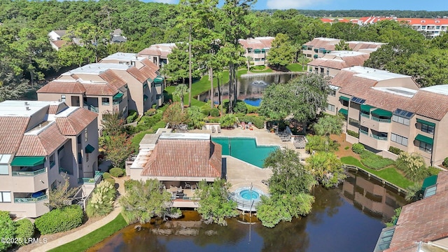 bird's eye view with a water view