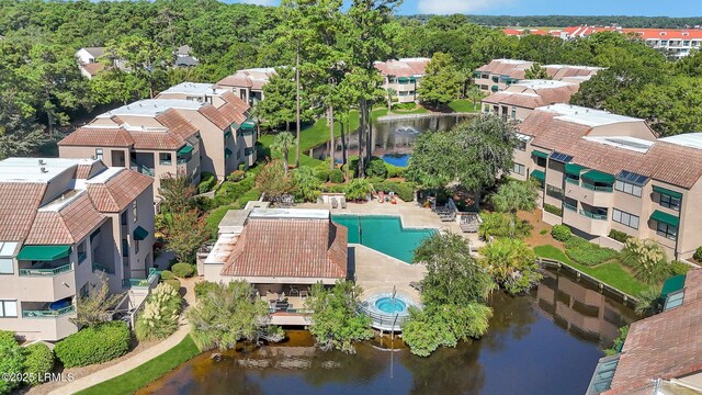 bird's eye view with a water view