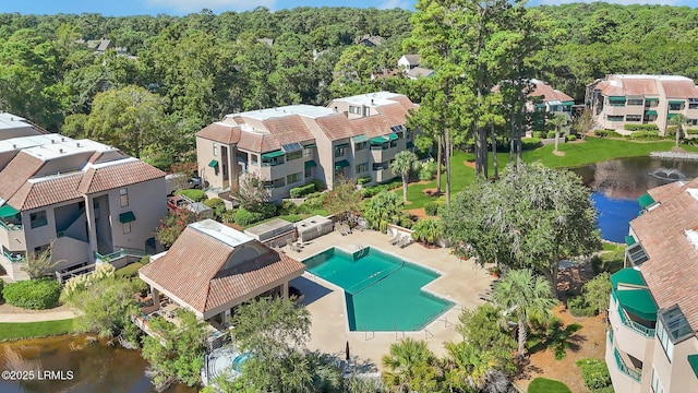 birds eye view of property featuring a water view