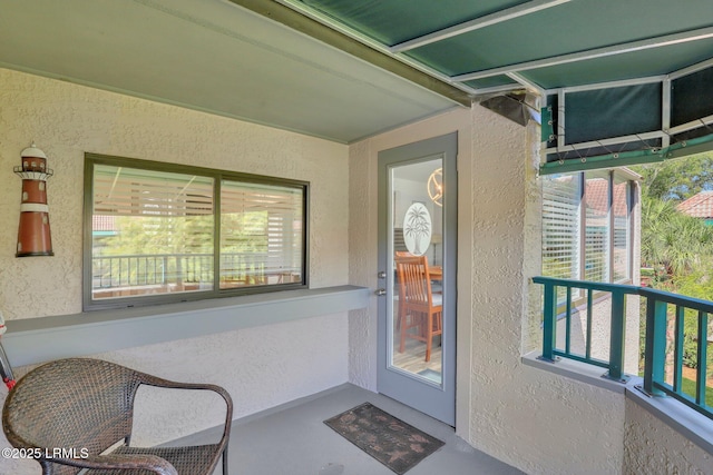 doorway to property with a balcony