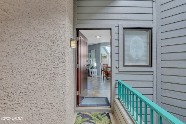 property entrance with a balcony