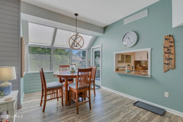 dining room featuring hardwood / wood-style floors