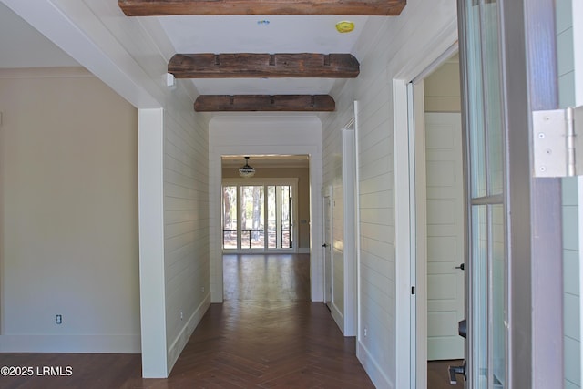 corridor featuring dark parquet floors and beamed ceiling