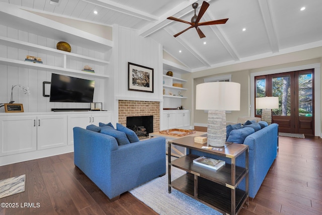 18 Baynard Cove Rd, Hilton Head Island, SC 29928 - living area with dark wood-type flooring, vaulted ceiling with beams, a ceiling fan, and built in features