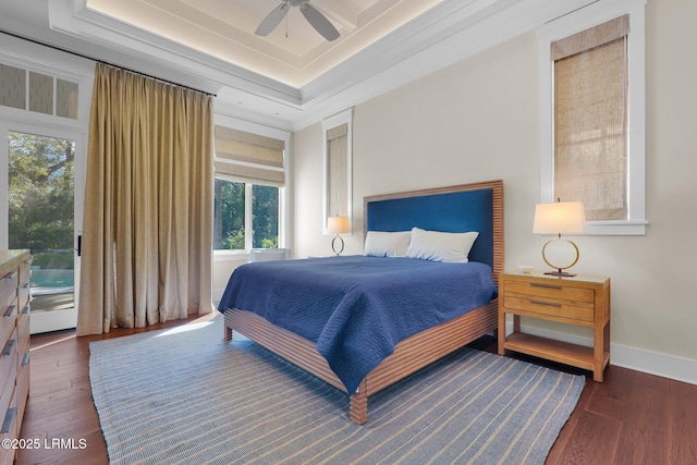 18 Baynard Cove Rd, Hilton Head Island, SC 29928 - bedroom featuring a raised ceiling, access to exterior, hardwood / wood-style floors, baseboards, and ceiling fan