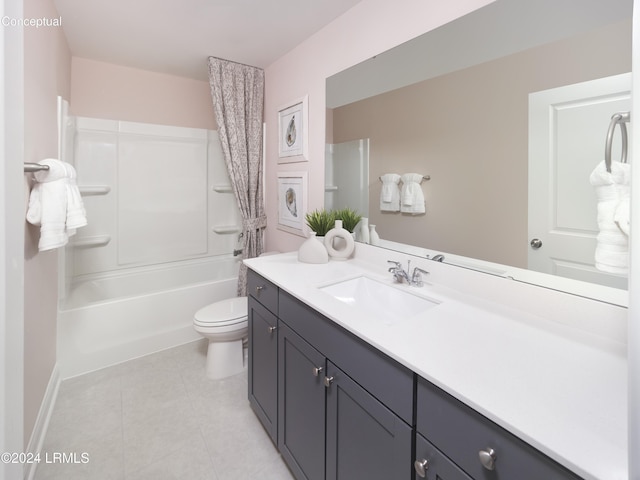 full bathroom featuring tile patterned floors, vanity, toilet, and shower / washtub combination