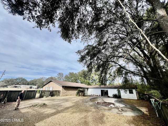 view of front of property featuring a patio