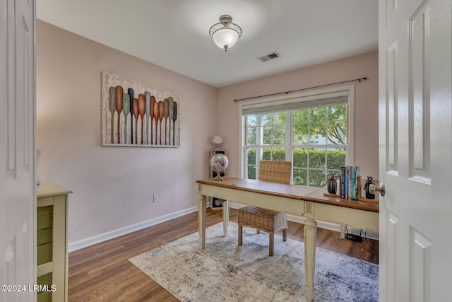 home office featuring dark wood-type flooring