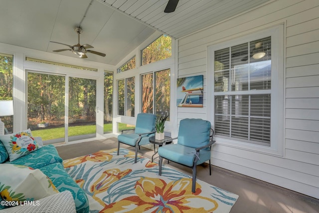 sunroom / solarium featuring ceiling fan and lofted ceiling