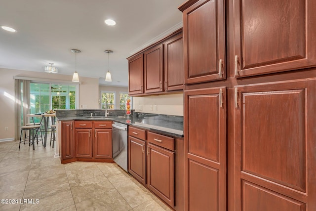 kitchen featuring hanging light fixtures, sink, stainless steel dishwasher, and kitchen peninsula