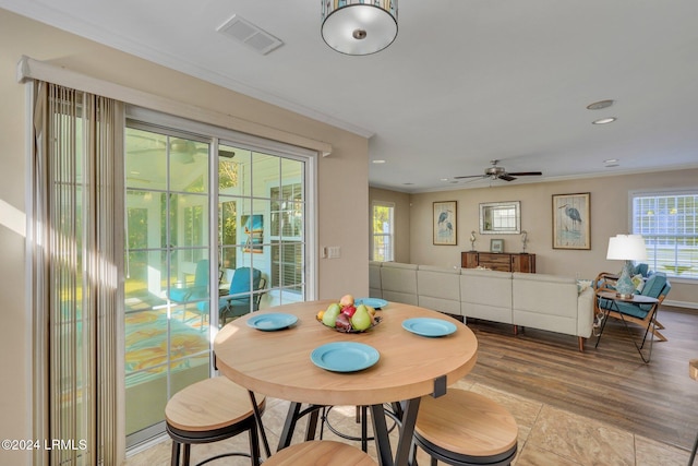 dining area featuring ornamental molding