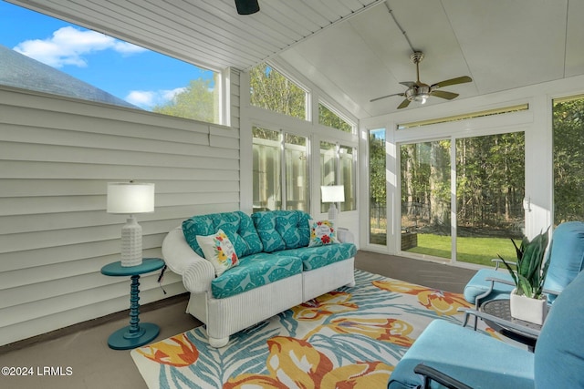 sunroom / solarium with vaulted ceiling and ceiling fan