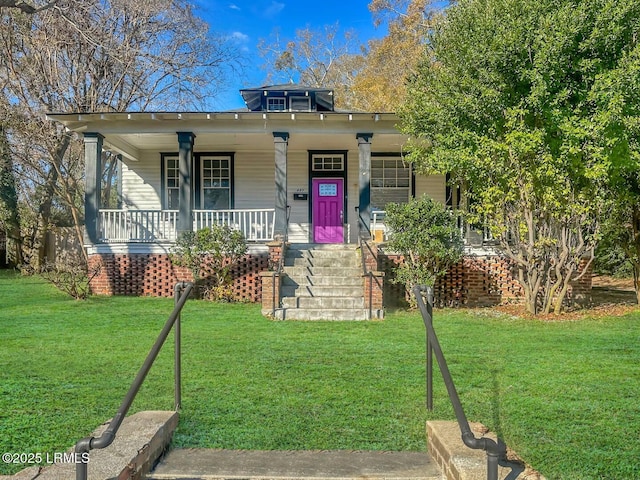 bungalow-style house with a porch and a front yard