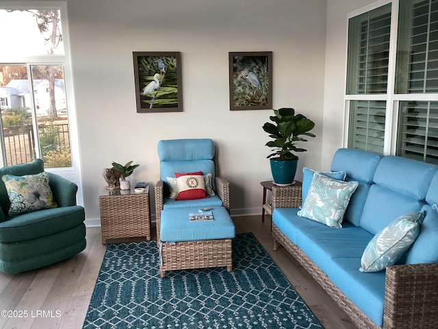 sitting room with hardwood / wood-style floors