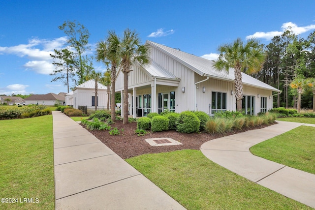 exterior space featuring a front lawn