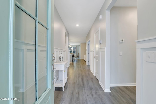 corridor featuring light wood-type flooring