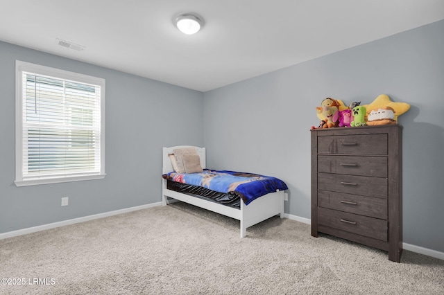 346 Sawmill Rd, Hardeeville, SC 29927 - bedroom with baseboards, visible vents, and light colored carpet