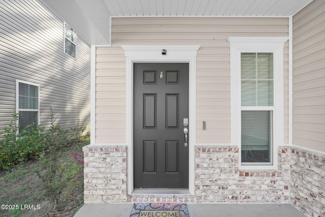 346 Sawmill Rd, Hardeeville, SC 29927 - doorway to property with stone siding and covered porch