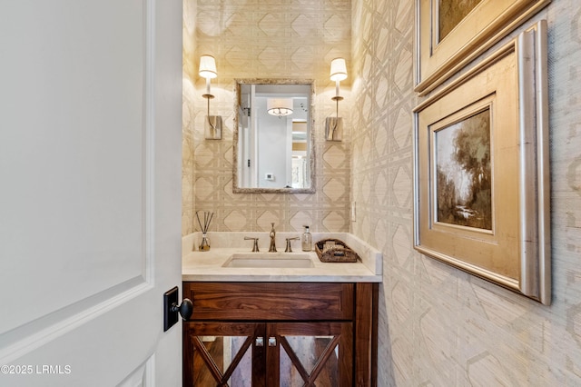 bathroom with tile walls and vanity