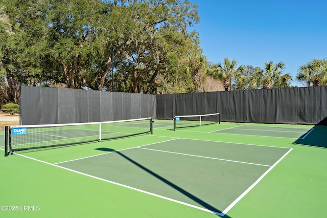 view of sport court with community basketball court and fence