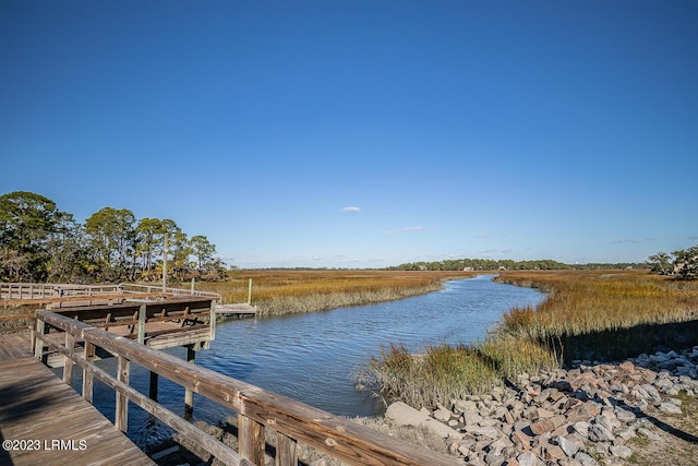 dock area with a water view