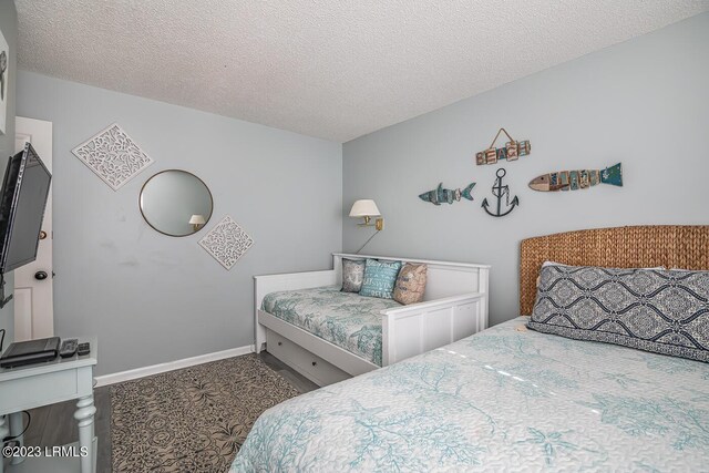 bedroom with a textured ceiling