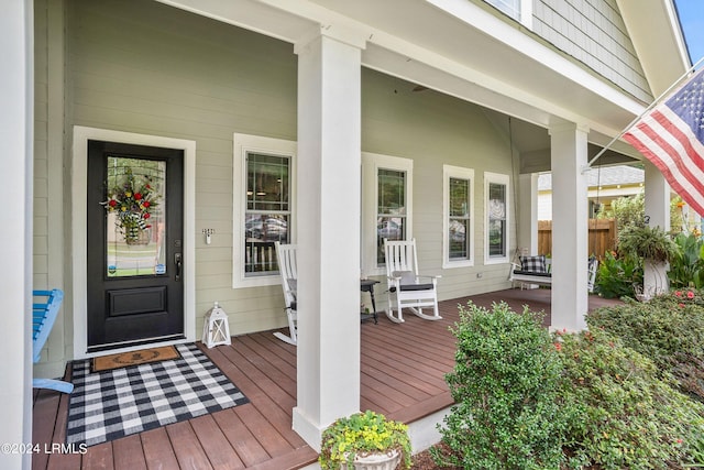 entrance to property with a porch