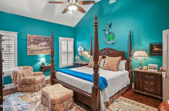 bedroom featuring hardwood / wood-style flooring, ceiling fan, and lofted ceiling