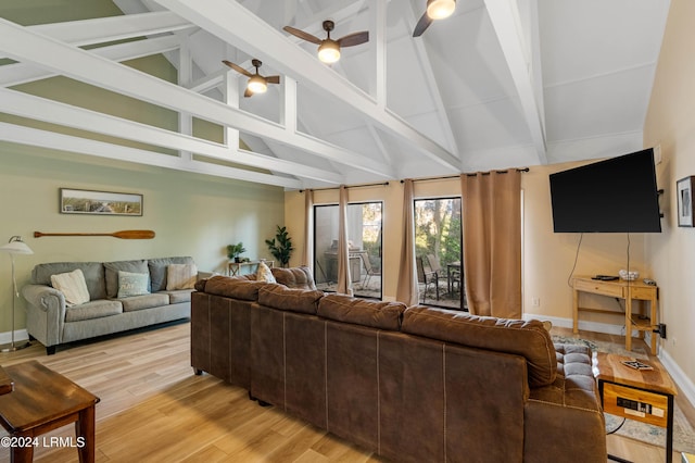 living room with beamed ceiling, ceiling fan, high vaulted ceiling, and light hardwood / wood-style floors