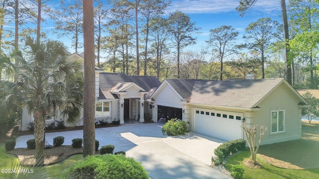 view of front of property with a garage