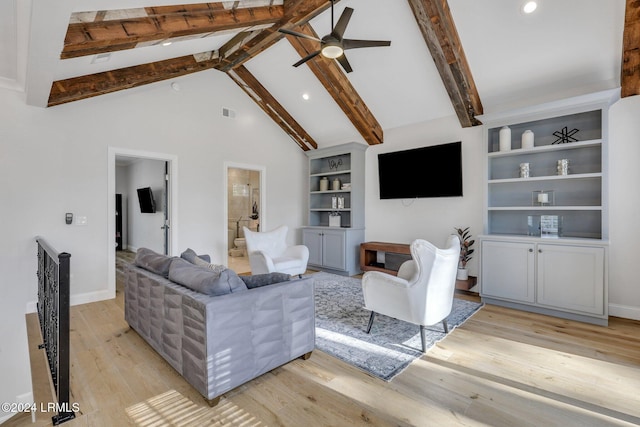 living room featuring built in features, high vaulted ceiling, ceiling fan, beam ceiling, and light hardwood / wood-style flooring