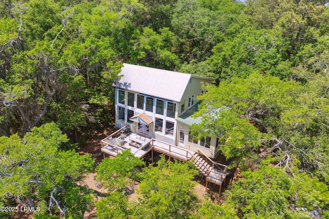 drone / aerial view with a view of trees