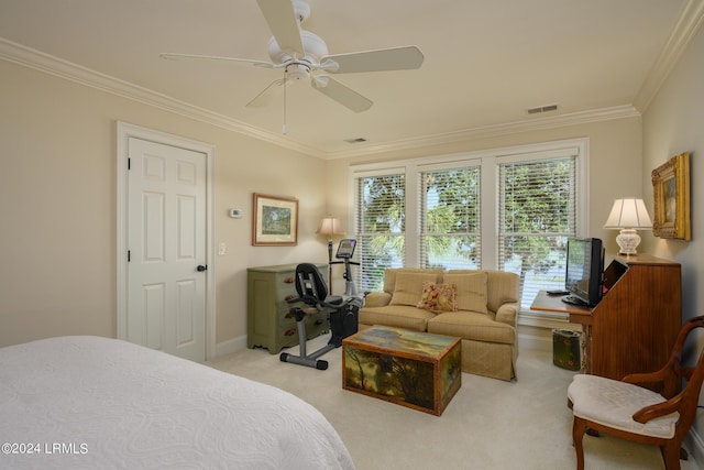 bedroom with ornamental molding, light colored carpet, and ceiling fan