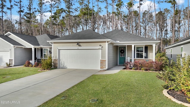 ranch-style home with a garage and a front lawn