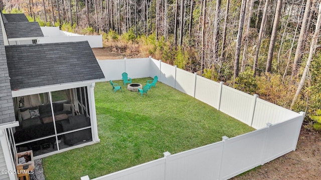 view of yard featuring a fire pit