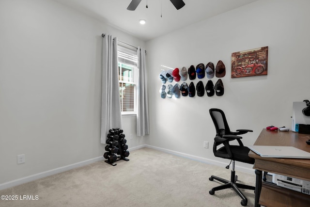 office area with light carpet and ceiling fan